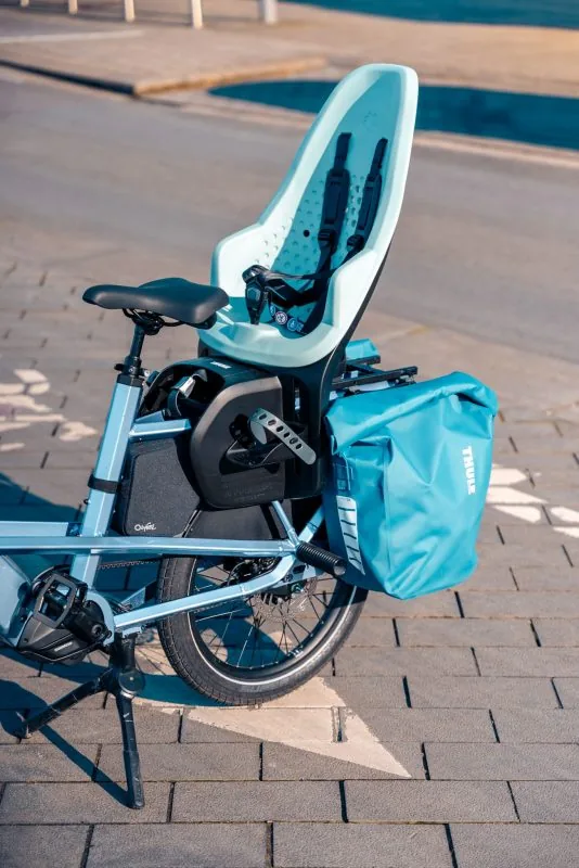 Kinderzitje en fietstas op een O2feel Buzz